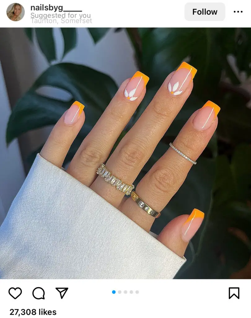 Orange French Tip with a flower Vacation Nails